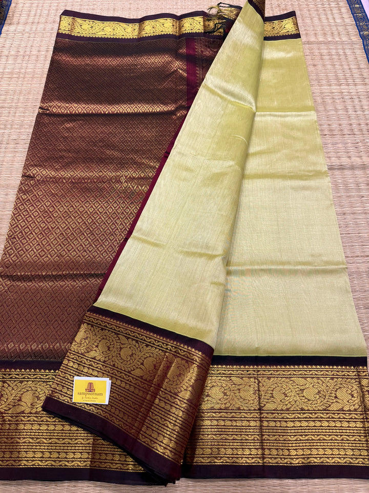 Elaichi Green with Araku  rich Kanchi one side big border and grand Pallu Korvai Silk Cotton Saree