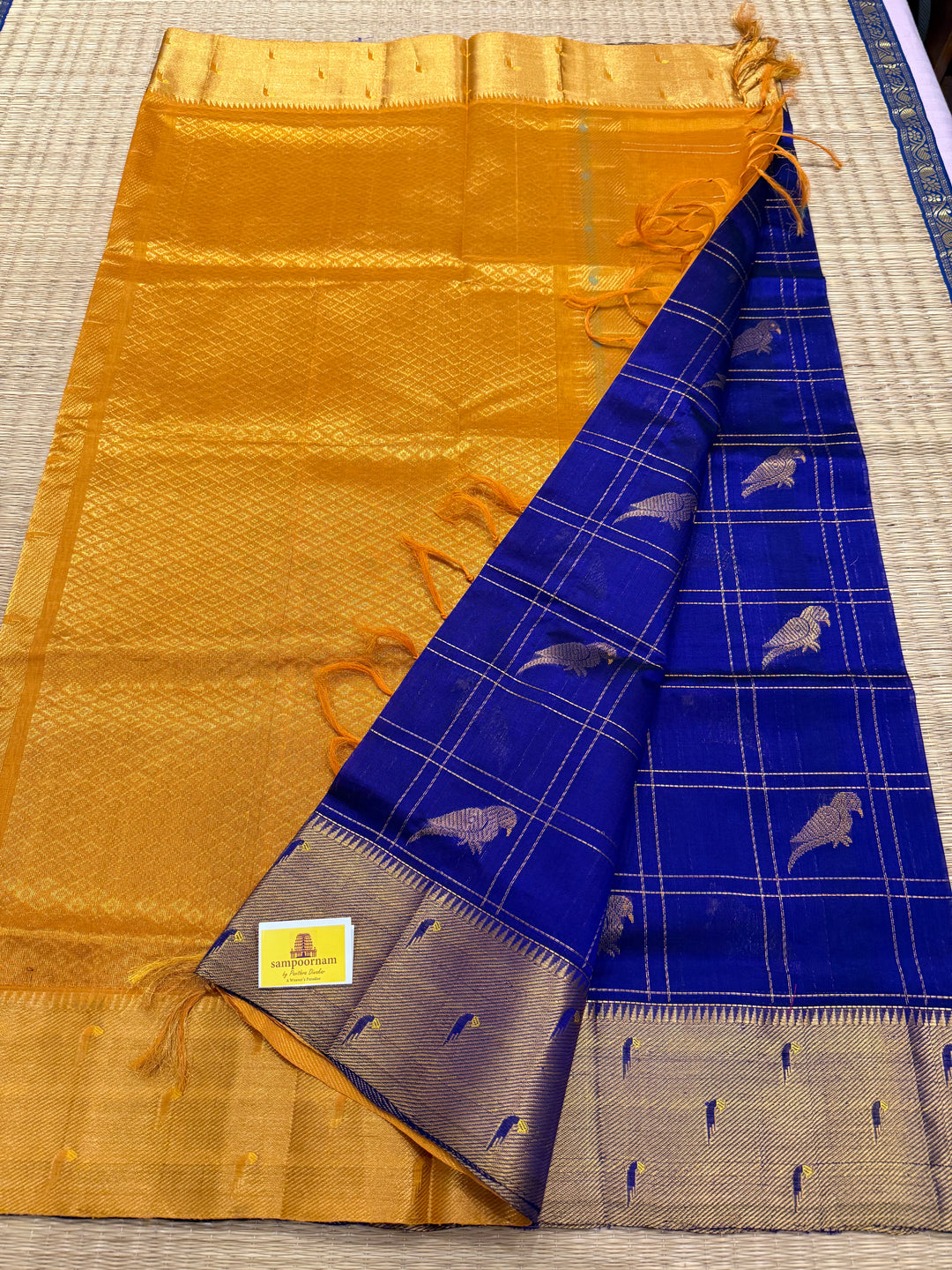 Blue with Mustard  Paithani  borders , parrot motifs in the body ,rich Pallu Korvai Silk Cotton Saree