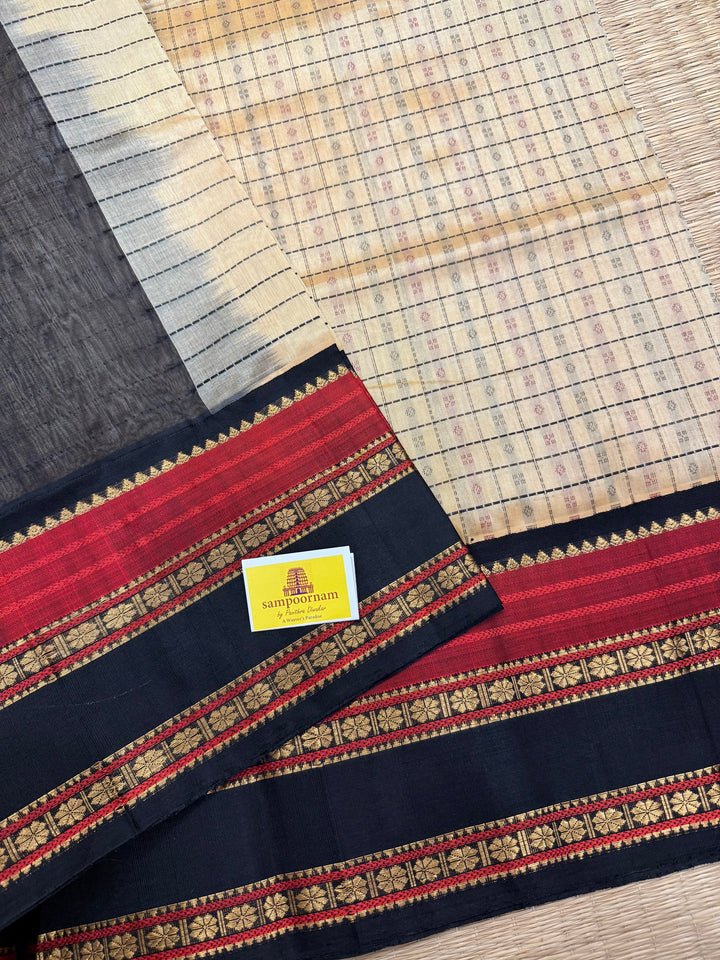 Cream with Black, Lakshadeepam thread butta in the body and silk border with rich Pallu Korvai Silk Cotton Saree