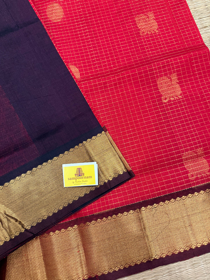 Red with Brown , rich Zari checks in the body , Mayil and Chakram butta , traditional borders and zari Pallu Silk Cotton Saree