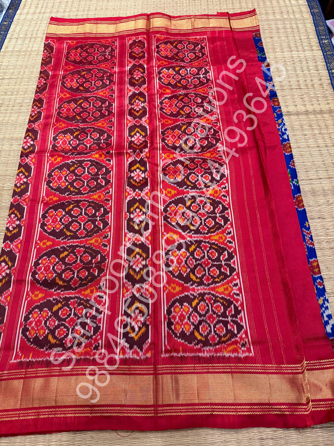 A Stunning Blue with Red saree with rich traditional border and Pochampally designs all over body and Grand Pallu , Pochampally Pure Silk Saree