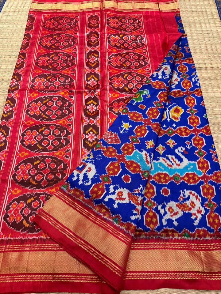 A Stunning Blue with Red saree with rich traditional border and Pochampally designs all over body and Grand Pallu , Pochampally Pure Silk Saree
