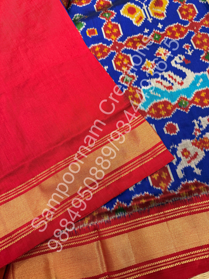 A Stunning Blue with Red saree with rich traditional border and Pochampally designs all over body and Grand Pallu , Pochampally Pure Silk Saree
