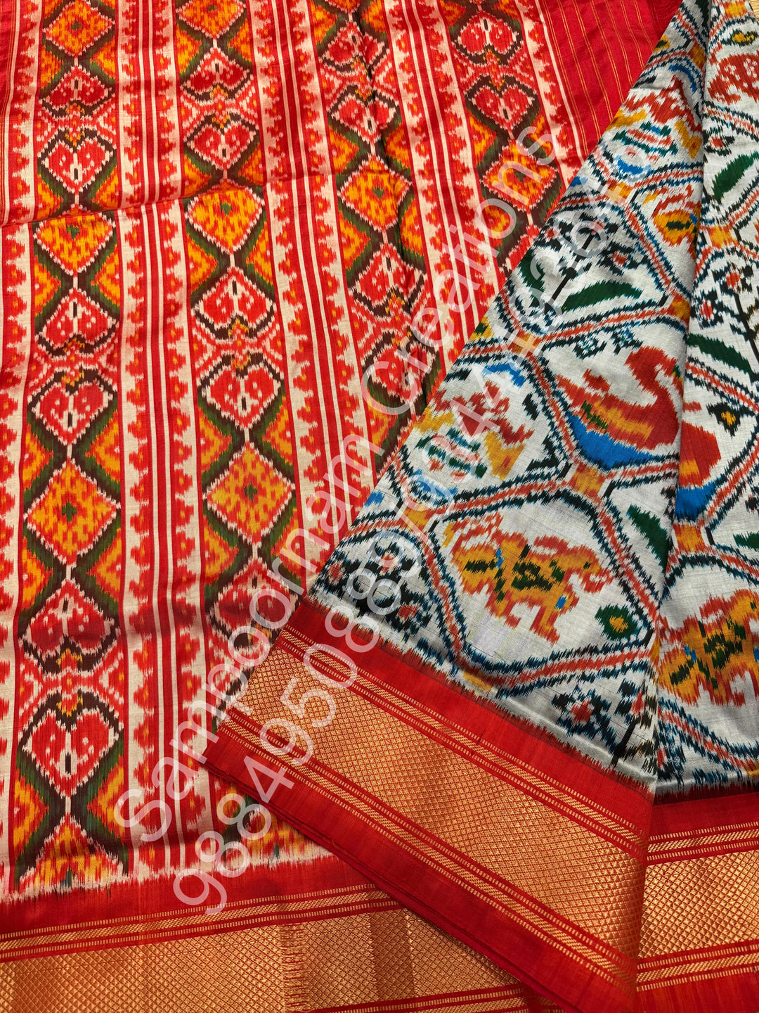 A Classic Steel Grey with Red saree with rich traditional border and Pochampally designs all over body and Grand Palllu , Pochampally Pure Silk Saree