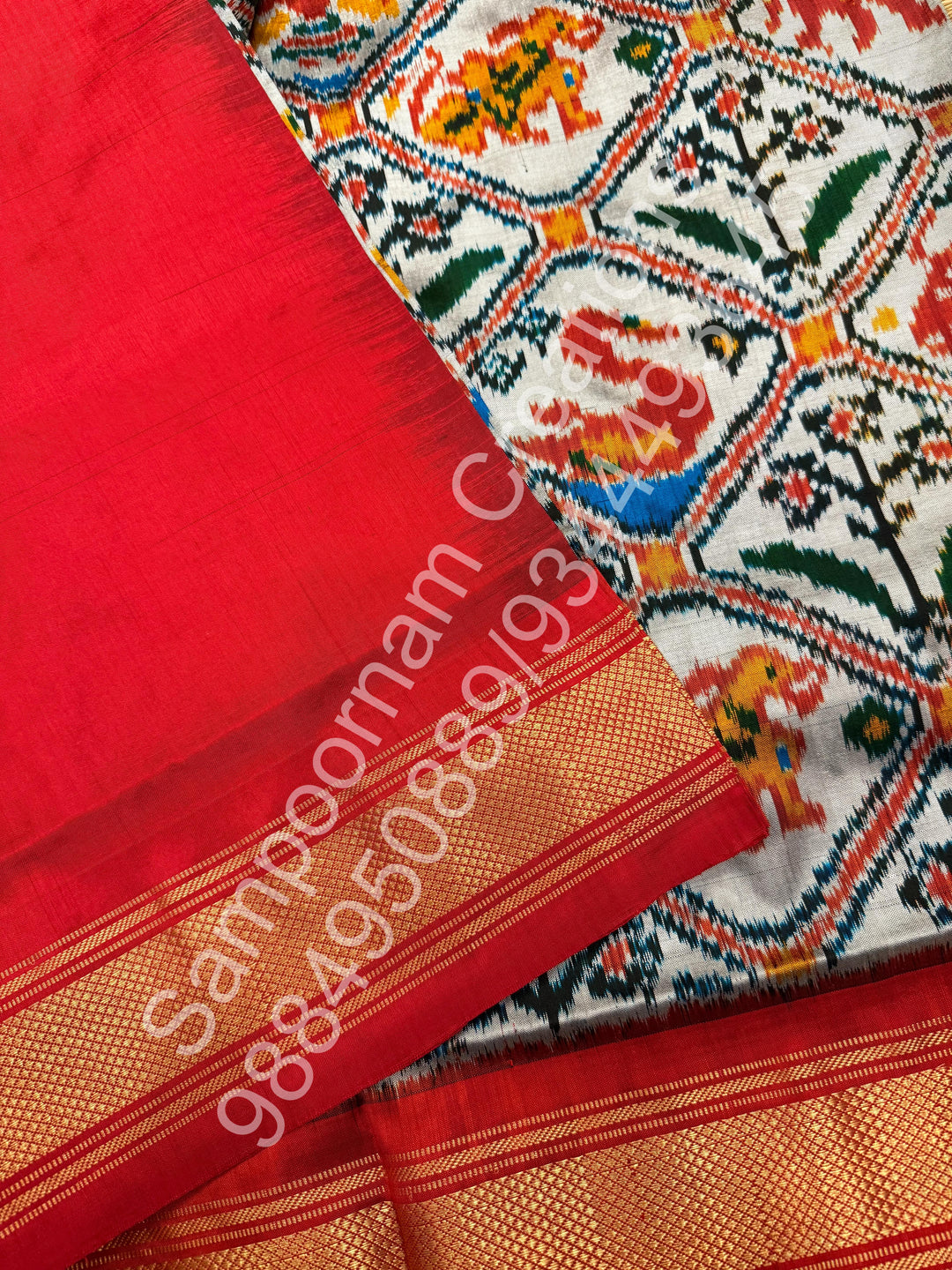 A Classic Steel Grey with Red saree with rich traditional border and Pochampally designs all over body and Grand Palllu , Pochampally Pure Silk Saree