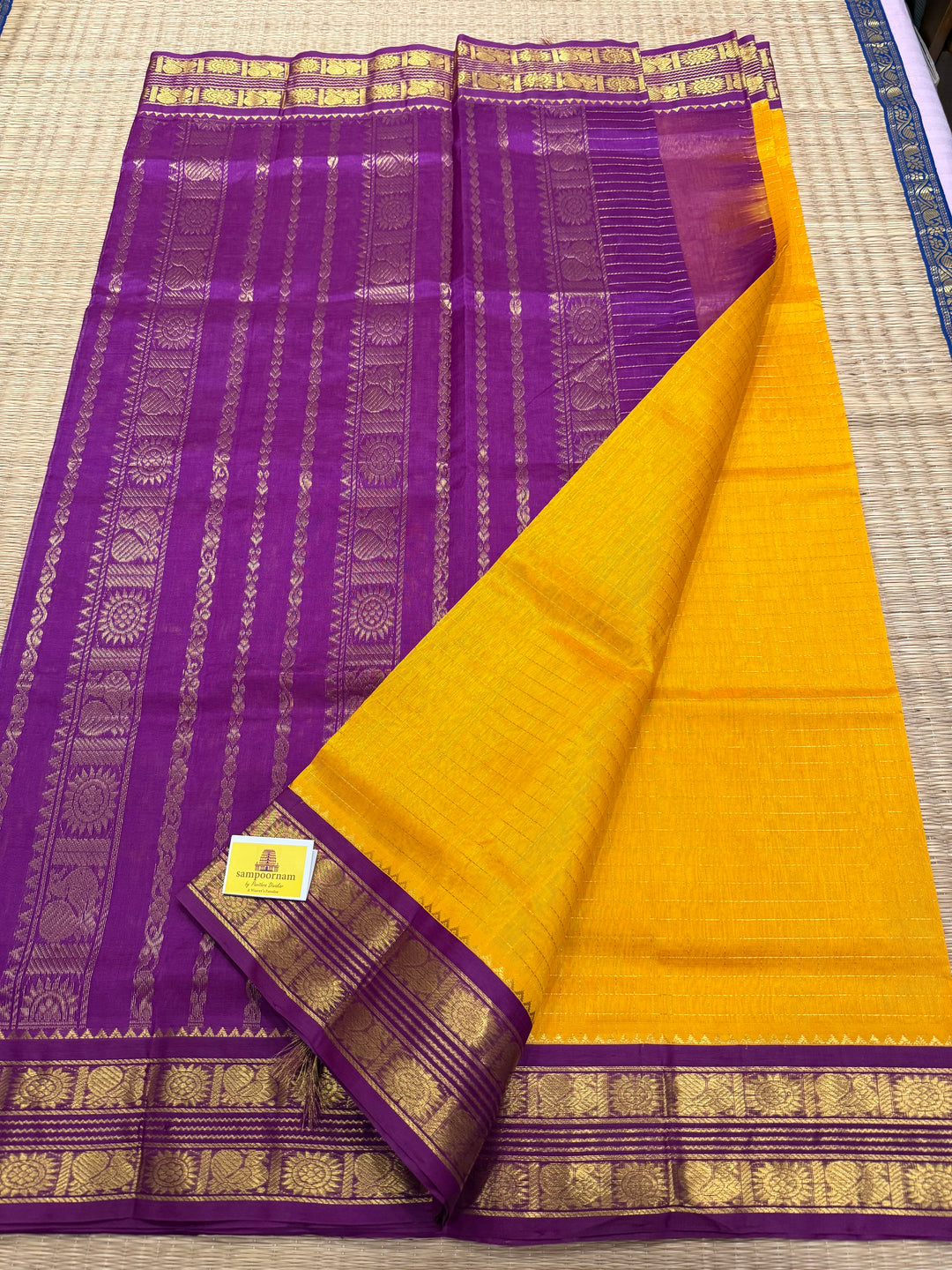 Mambazha Manjal with Purple , rich Zari checks in the body ,rettapet border and grand Pallu Korvai Silk Cotton Sareeb