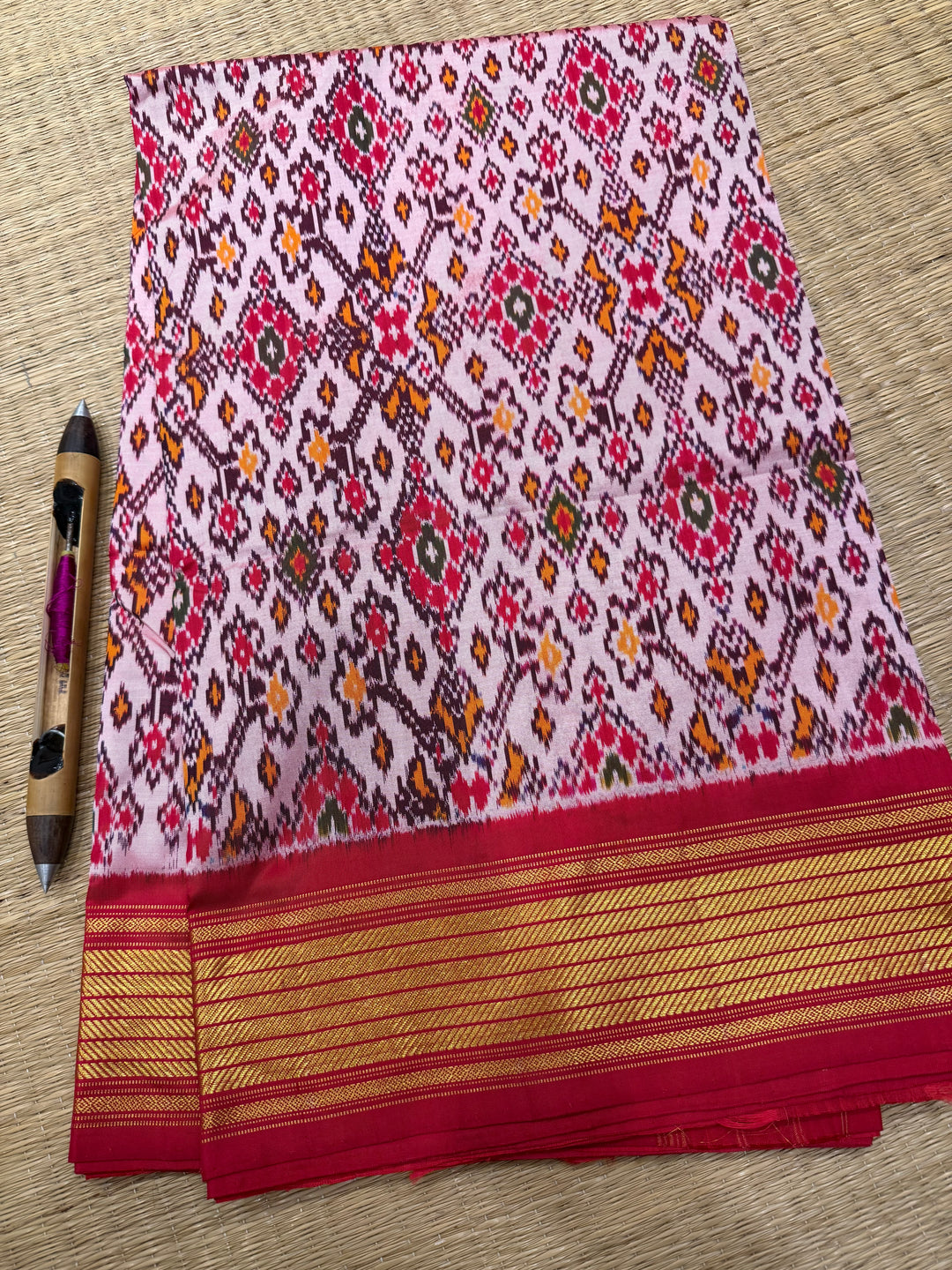 A Classic Pastel Pink saree with rich traditional border and Pochampally designs all over body and Grand Pallu , Pochampally Pure Silk Saree