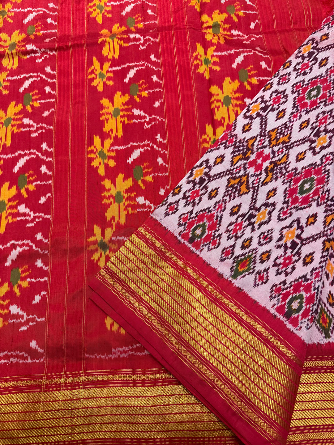 A Classic Pastel Pink saree with rich traditional border and Pochampally designs all over body and Grand Pallu , Pochampally Pure Silk Saree