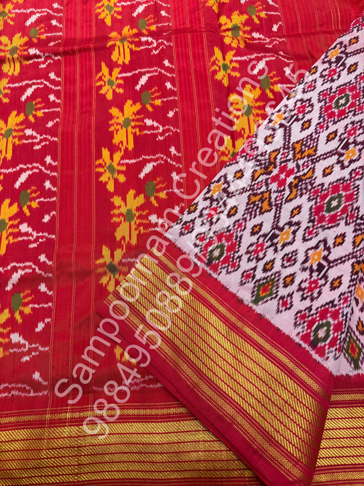 A Classic Pastel Pink saree with rich traditional border and Pochampally designs all over body and Grand Pallu , Pochampally Pure Silk Saree