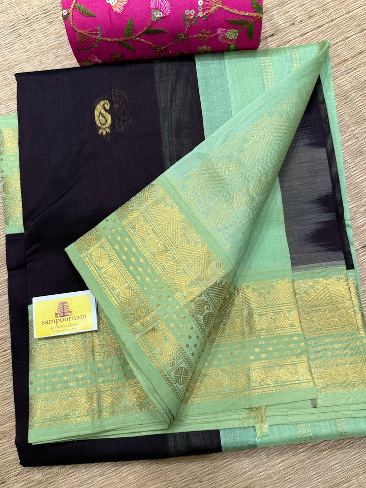 Dark Brown with Pastel Green , Lakshadeepam borders and rich Pallu , Zari butta in the body Korvai Silk Cotton Saree