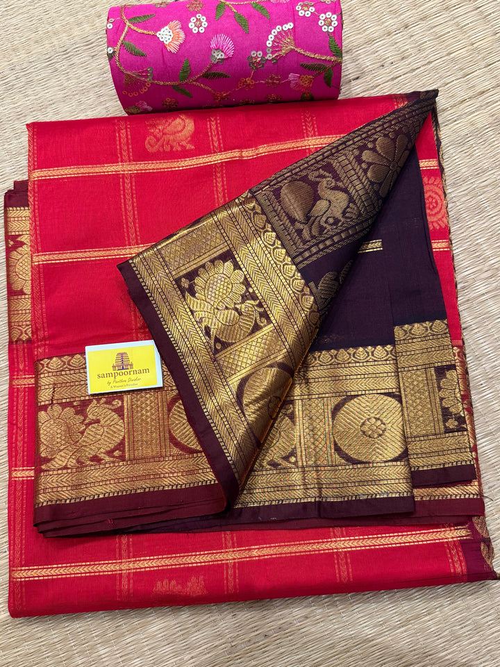 Red with Brown , rich Zari checks in the body , Mayil and Chakram butta , traditional borders and zari Pallu Silk Cotton Saree