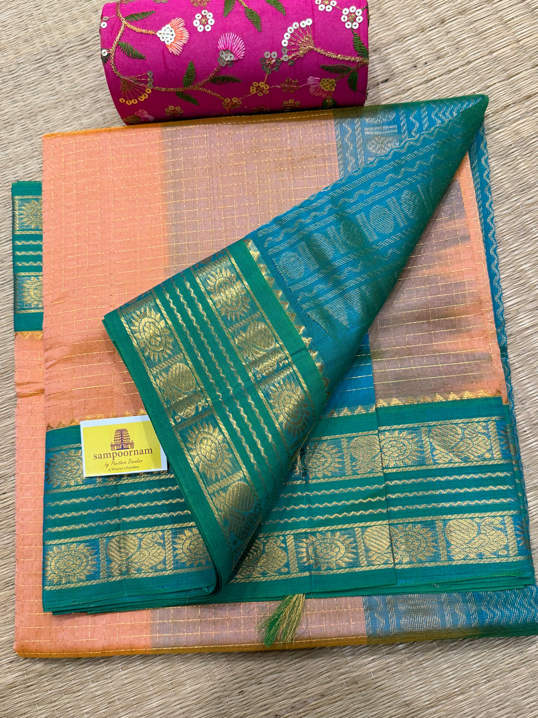 Peach Pink with Sea Green , rich Zari checks in the body ,rettapet border and grand Pallu Korvai Silk Cotton Saree