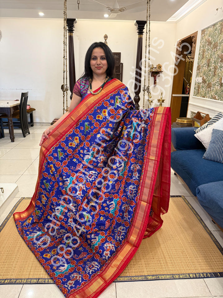 A Stunning Blue with Red saree with rich traditional border and Pochampally designs all over body and Grand Pallu , Pochampally Pure Silk Saree