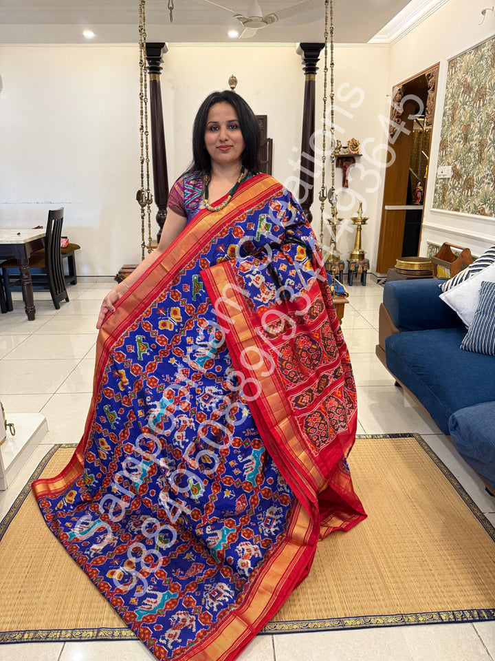 A Stunning Blue with Red saree with rich traditional border and Pochampally designs all over body and Grand Pallu , Pochampally Pure Silk Saree