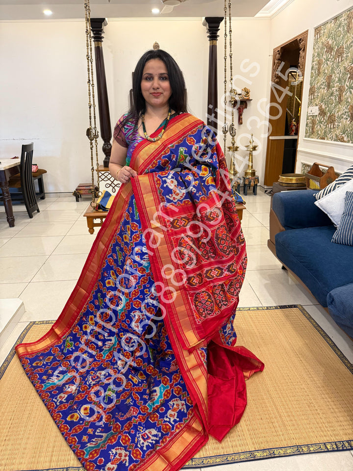 A Stunning Blue with Red saree with rich traditional border and Pochampally designs all over body and Grand Pallu , Pochampally Pure Silk Saree