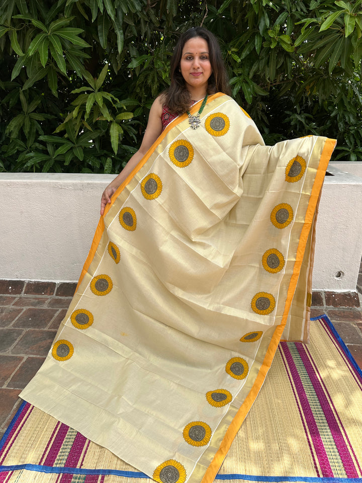 Offwhite Kerala Tissue Saree with Sunflower Motif and With a Yellow Border Piping