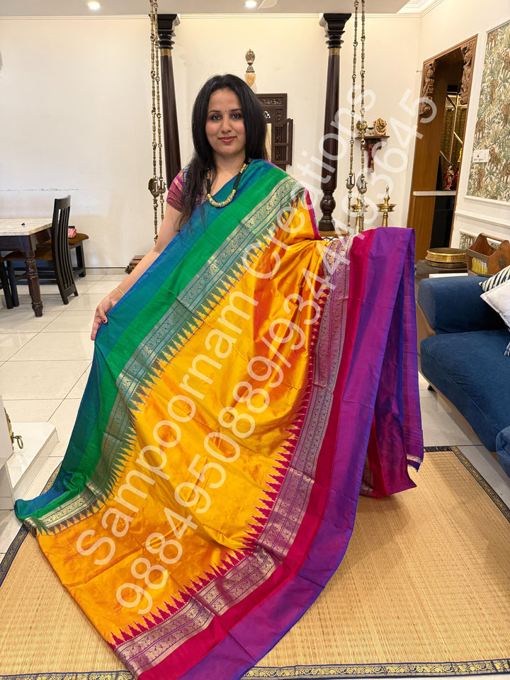 Dark Yellow , Ganga Jamuna Kanchi rich border and Ikkat Pallu with designer Ikkat  printed Blouse , Pochampally Pure Silk Saree