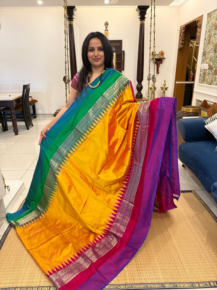 Dark Yellow , Ganga Jamuna Kanchi rich border and Ikkat Pallu with designer Ikkat  printed Blouse , Pochampally Pure Silk Saree