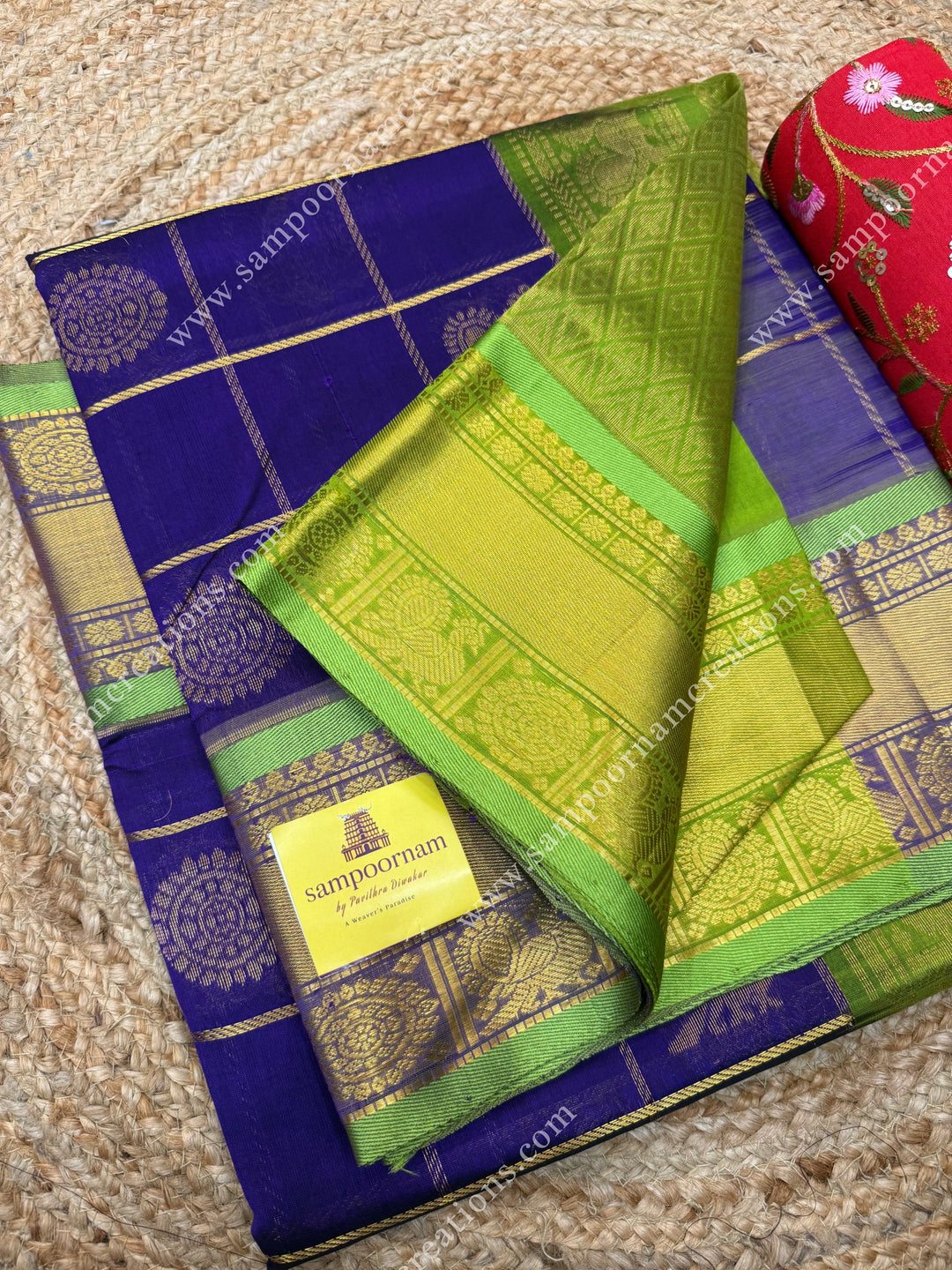 Indigo with Lemon Yellow  , rich Zari checks in the body , Mayil and Chakram rich butta in the body , traditional border rich Pallu Silk Cotton Saree