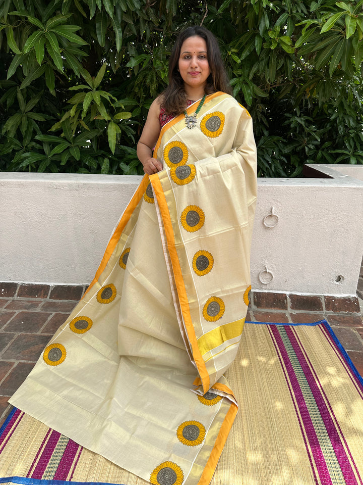 Offwhite Kerala Tissue Saree with Sunflower Motif and With a Yellow Border Piping