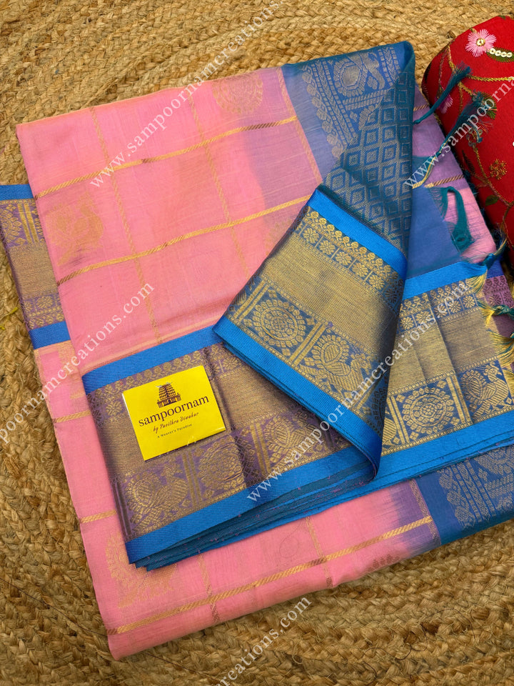 Baby Pink with Turquoise Blue  , rich Zari checks in the body , Mayil and Chakram rich butta in the body , traditional border rich Pallu Silk Cotton Saree