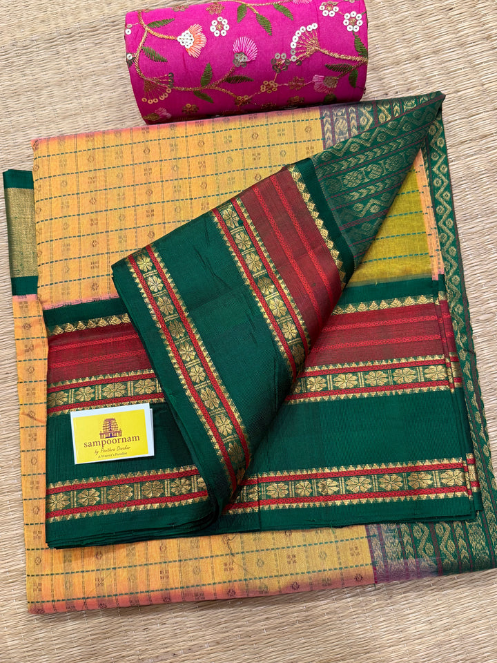 Peach Pink with Green , Lakshadeepam thread butta in the body and silk border with rich Pallu Korvai Silk Cotton Saree