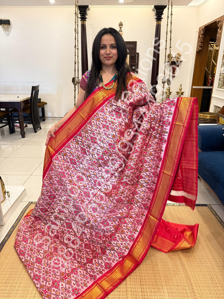 A Classic Pastel Pink saree with rich traditional border and Pochampally designs all over body and Grand Pallu , Pochampally Pure Silk Saree