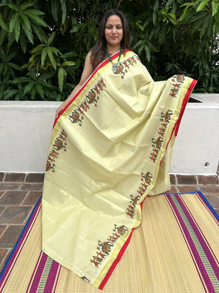 Kerala Tissue Saree with Royal Elephant Procession and Red Border Piping