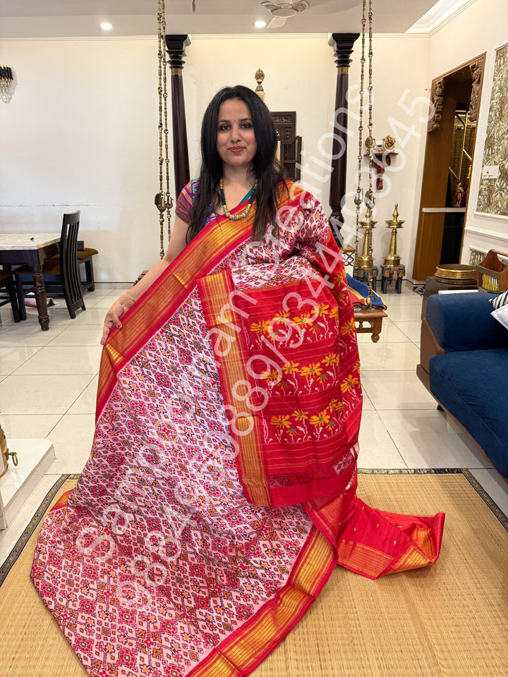 A Classic Pastel Pink saree with rich traditional border and Pochampally designs all over body and Grand Pallu , Pochampally Pure Silk Saree