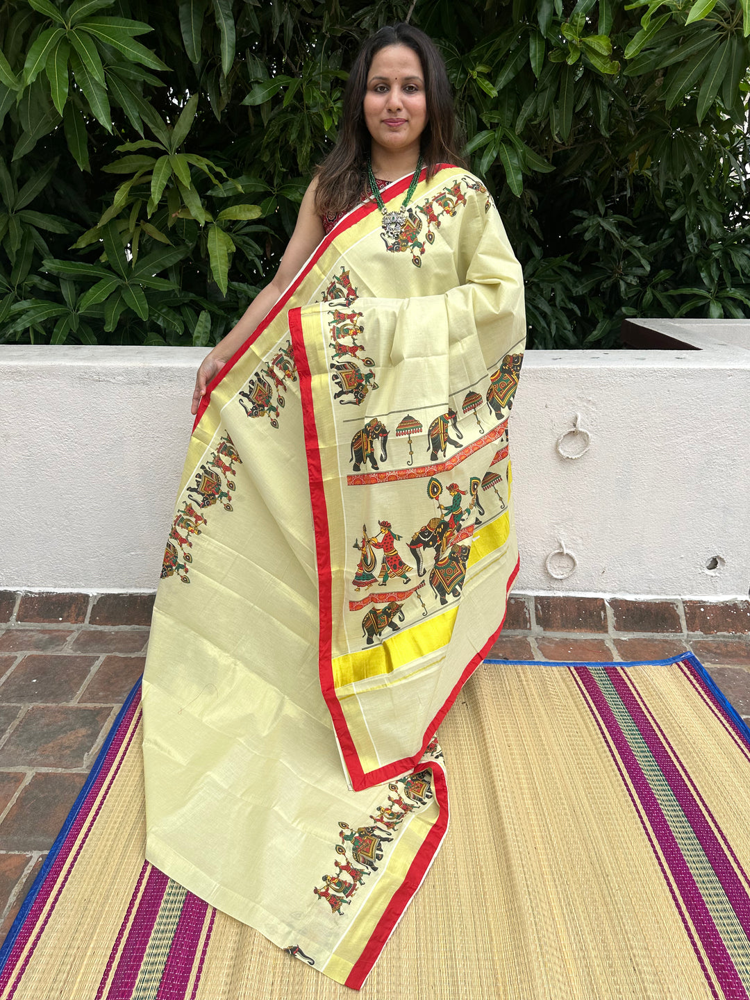 Kerala Tissue Saree with Royal Elephant Procession and Red Border Piping