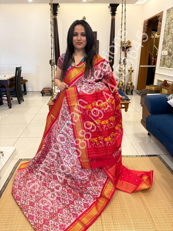 A Classic Pastel Pink saree with rich traditional border and Pochampally designs all over body and Grand Pallu , Pochampally Pure Silk Saree