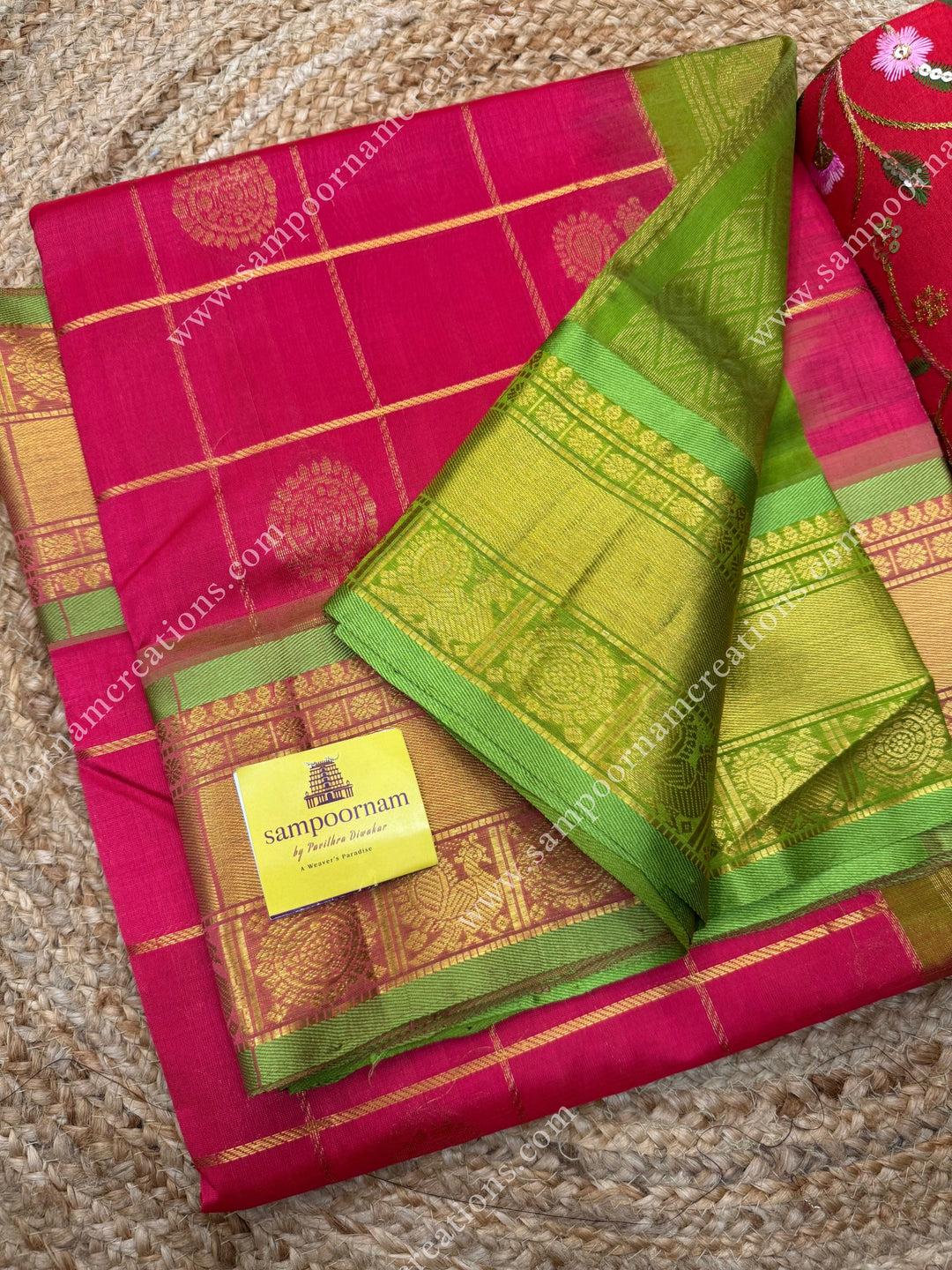 Rich Pink with Lemon Green  , rich Zari checks in the body , Mayil and Chakram rich butta in the body , traditional border rich Pallu Silk Cotton Saree
