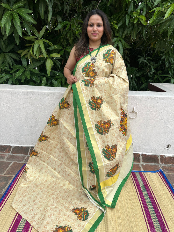 Kerala Tissue Saree with Krishna Flute and Peacock Feather Motif, Allover Peacock Feather Motifs and Green Piping in Border