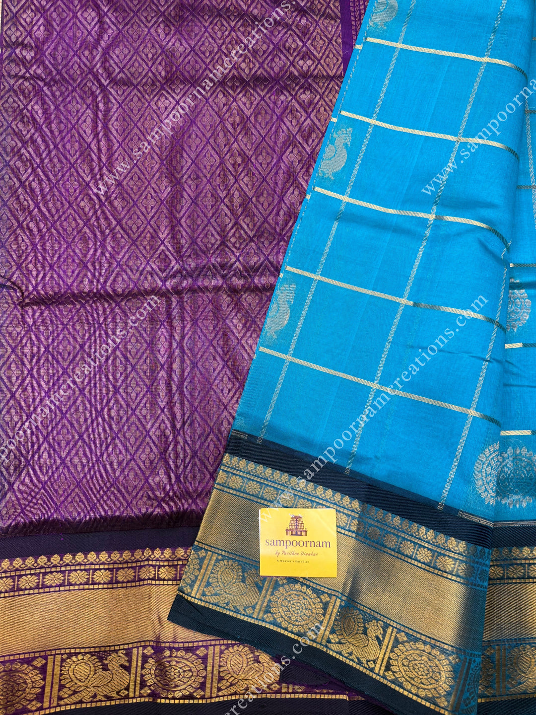 Ramar Blue with Purple  , rich Zari checks in the body , Mayil and Chakram rich butta in the body , traditional border rich Pallu Silk Cotton Saree