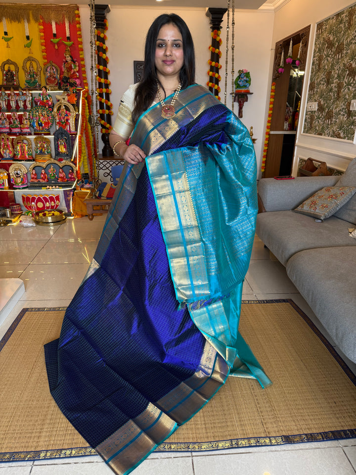 Dark Blue with Light Blue ,Lakshadeepam thread butta in the body , traditional borders and rich Pallu Silk Cotton Saree