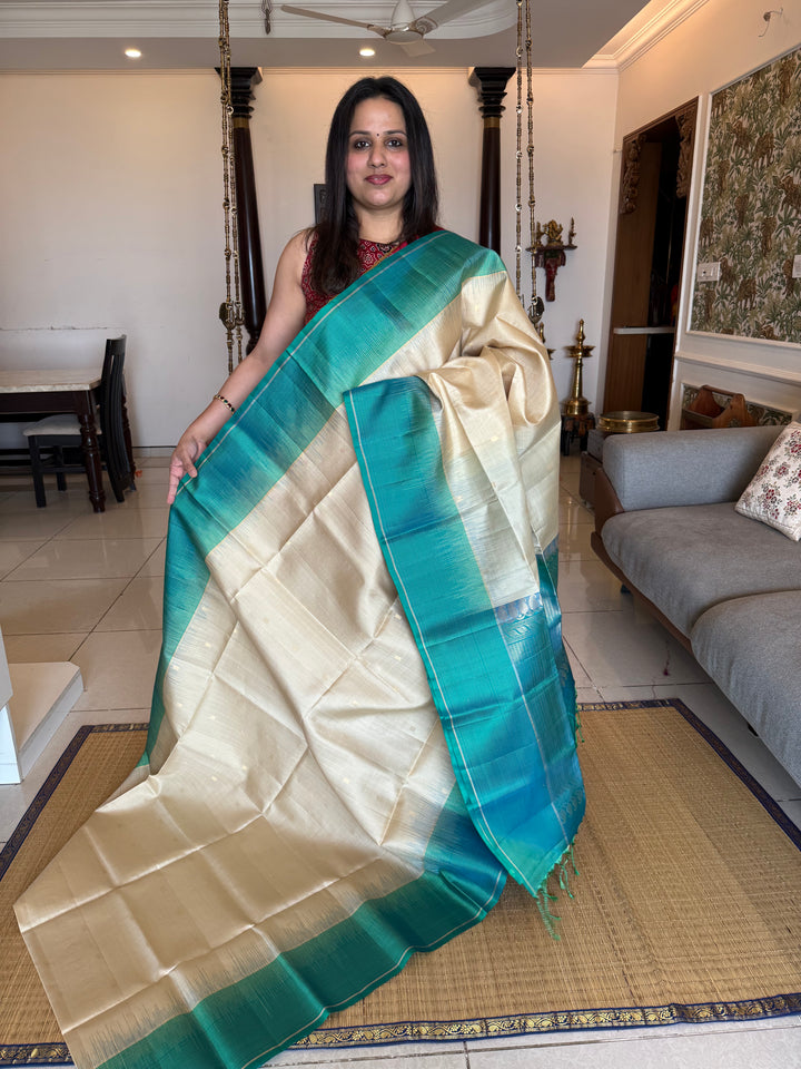 Beige with Turquoise Blue, Vairaoosi Borders, Zari Butta and Dotted Lines in the Body , Rich Pallu, Pure Soft Silk Saree