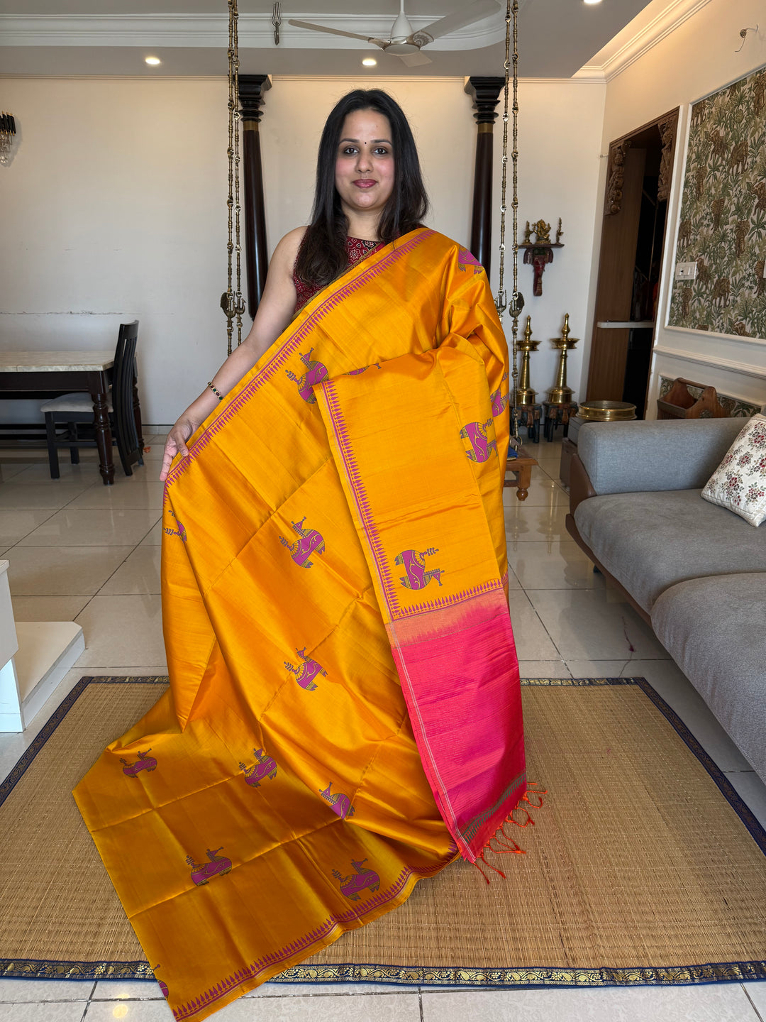 A Trendy Yellow with Pink, Handblock Printed Terracota Horse Designs in the Body , Rich Vairaoosi Pallu and Blouse Pure Soft Silk Saree
