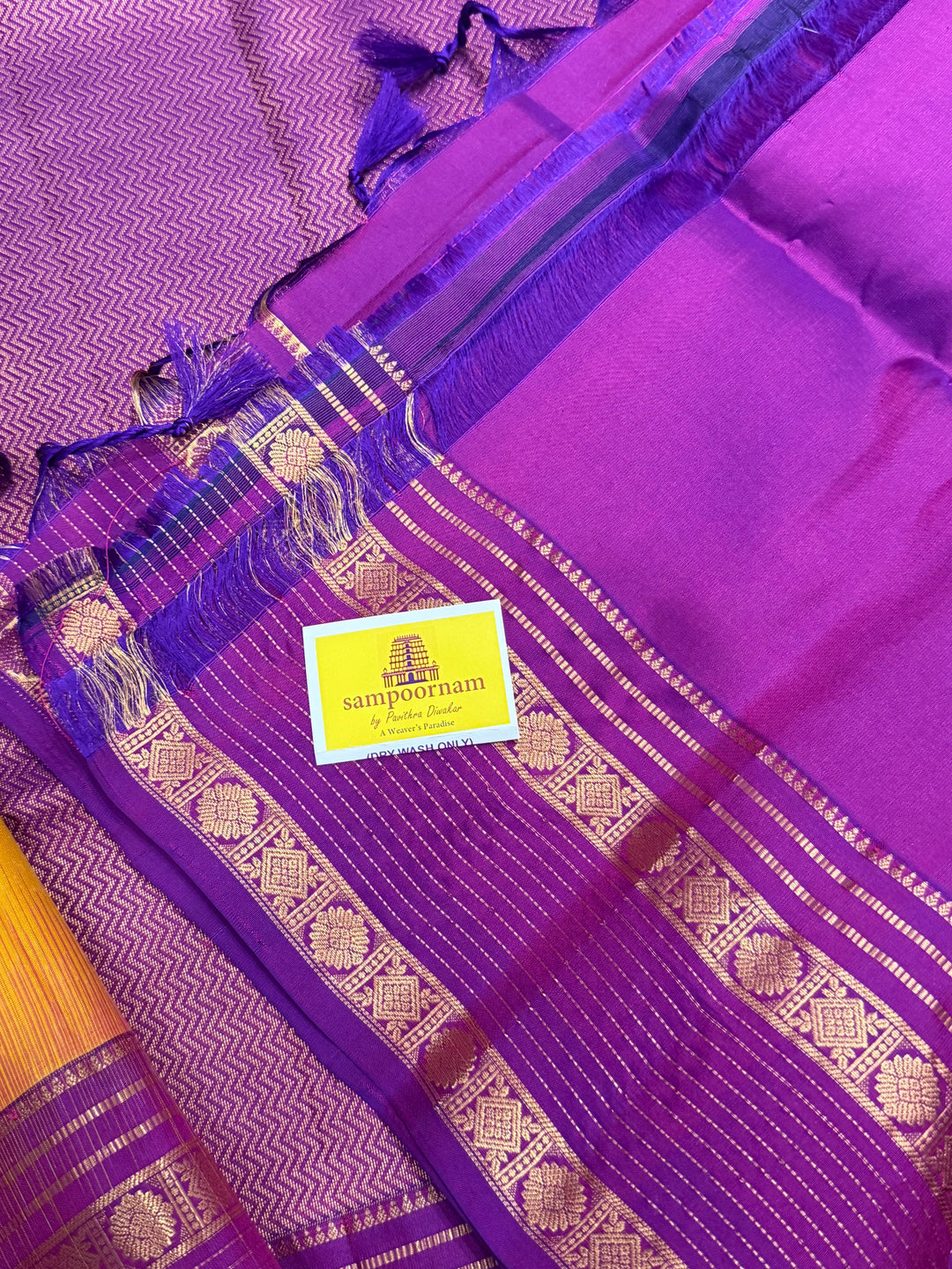 A classic Manjal with Purple, Rich Butta in the Body, Rettapet Traditional Borders and Grand Pallu Pure Soft Silk Saree