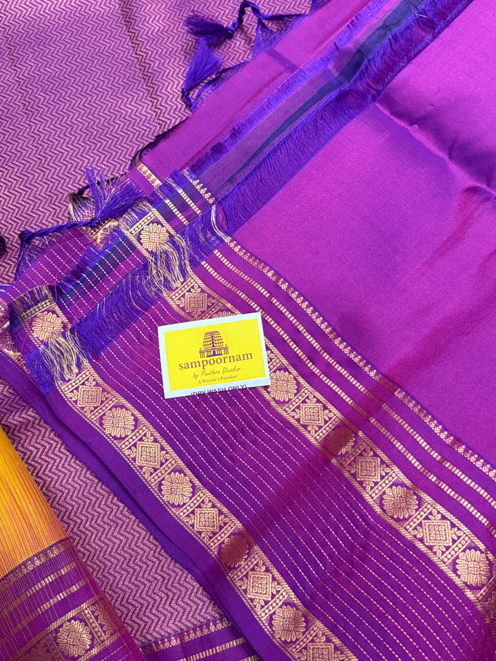 A classic Manjal with Purple, Rich Butta in the Body, Rettapet Traditional Borders and Grand Pallu Pure Soft Silk Saree