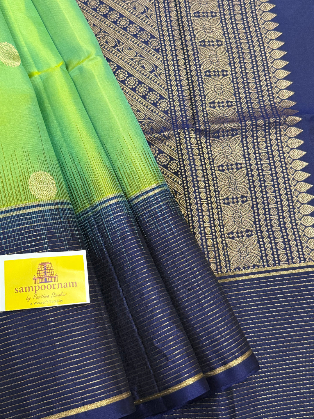 Pastel Green with Blue, Rich annam and chakram butta in the body, Vairaoosi Zari Lines in the border and Grand Pallu Pure Soft Silk Saree
