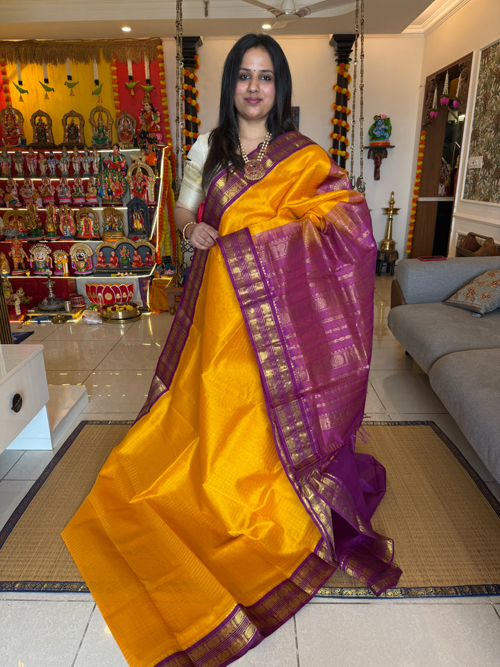 Mambazha Manjal with Purple , rich Zari checks in the body ,rettapet border and grand Pallu Korvai Silk Cotton Sareeb
