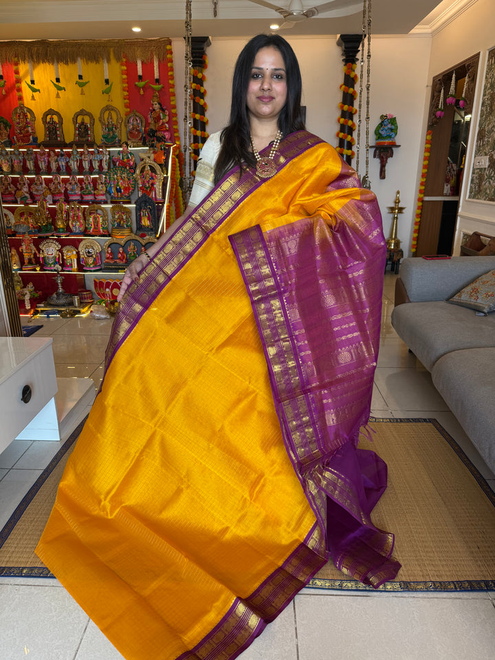 Mambazha Manjal with Purple , rich Zari checks in the body ,rettapet border and grand Pallu Korvai Silk Cotton Sareeb
