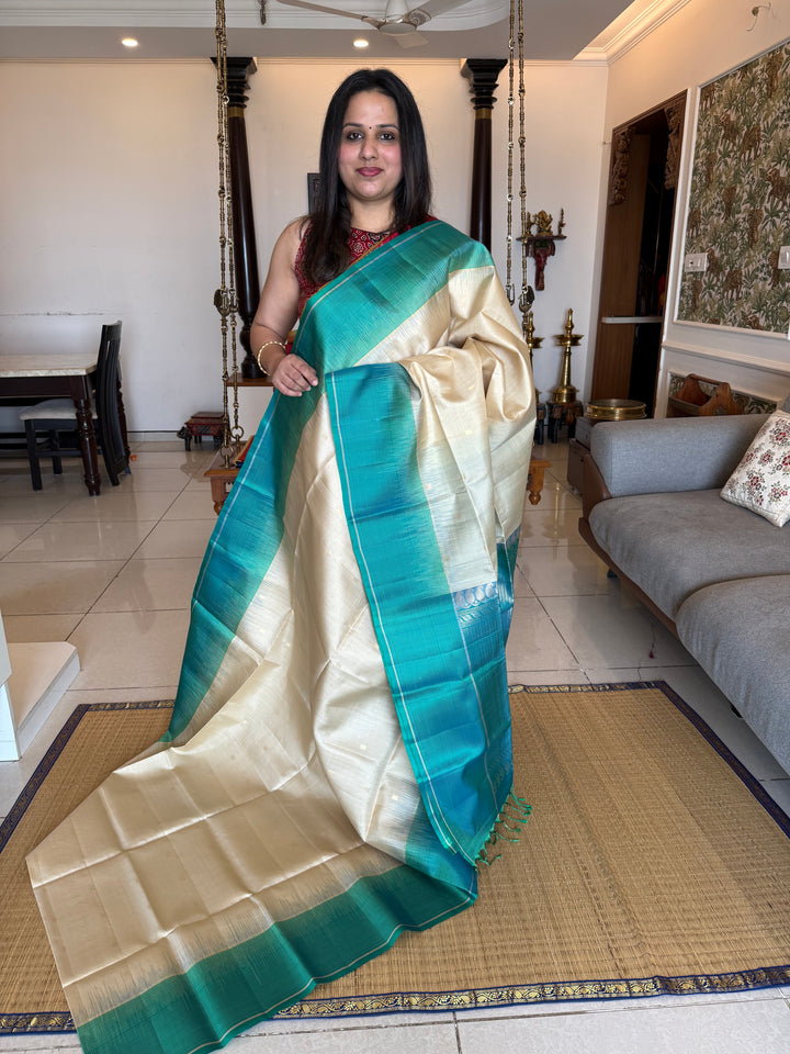 Beige with Turquoise Blue, Vairaoosi Borders, Zari Butta and Dotted Lines in the Body , Rich Pallu, Pure Soft Silk Saree