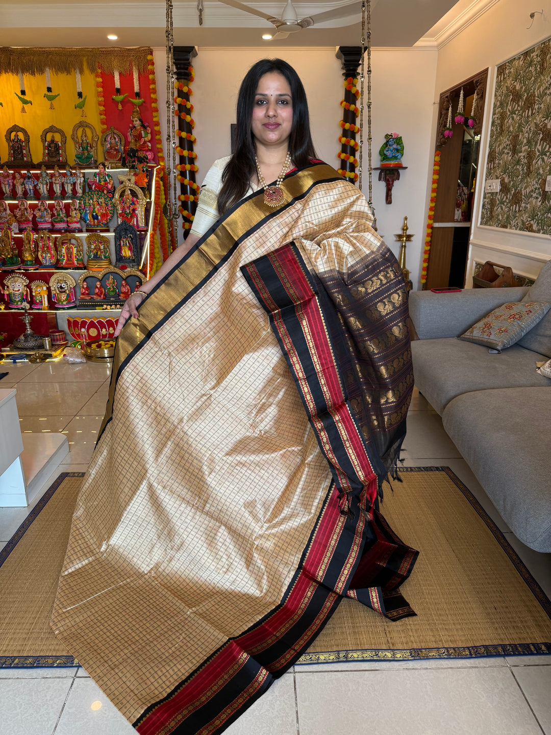 Cream with Black, Lakshadeepam thread butta in the body and silk border with rich Pallu Korvai Silk Cotton Saree