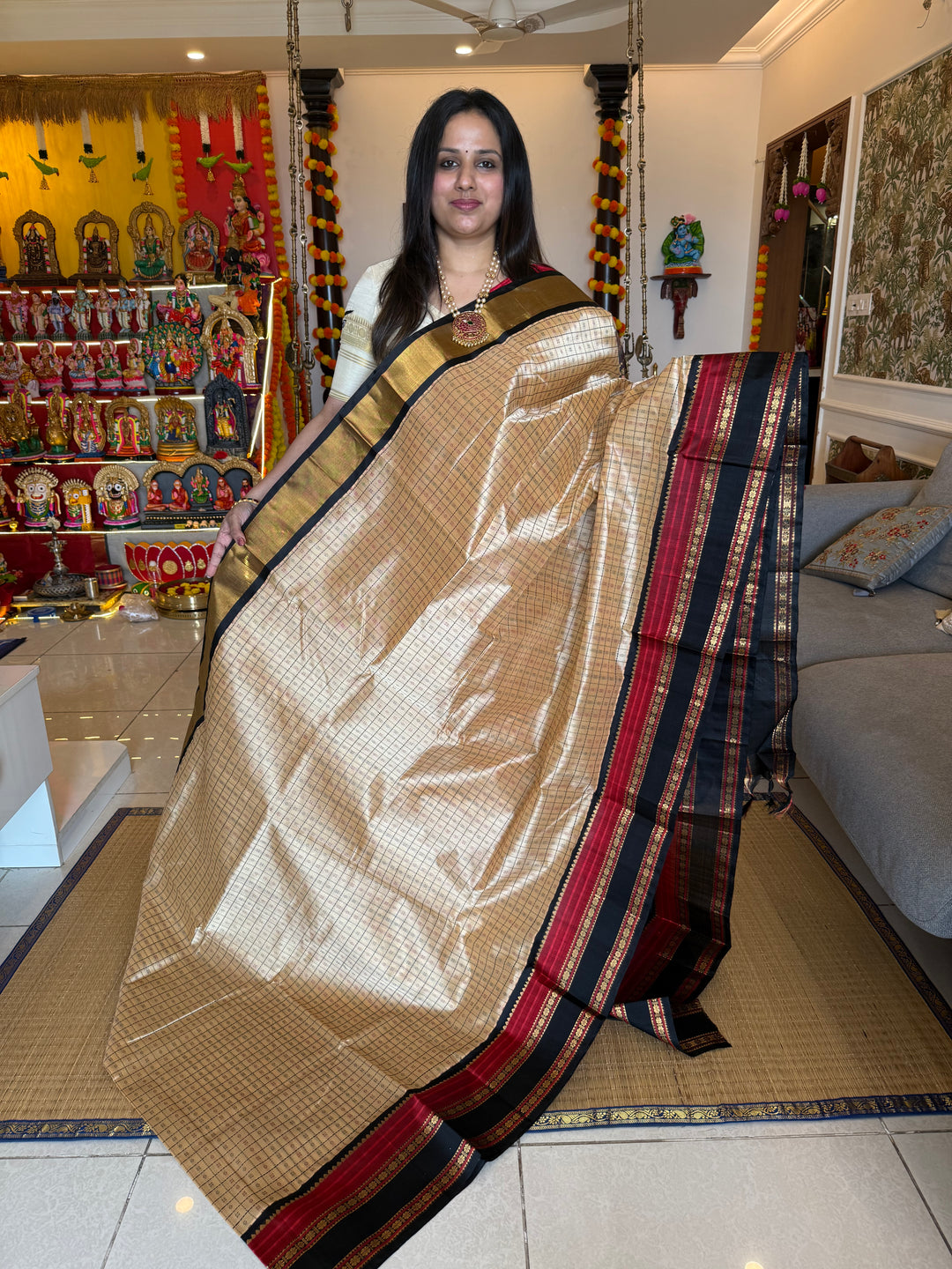 Cream with Black, Lakshadeepam thread butta in the body and silk border with rich Pallu Korvai Silk Cotton Saree