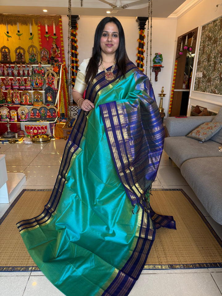 Ramar Blue with Blue  Vairaoosi Zari Lines in the body traditional borders and rich pallu korvai silk cotton saree