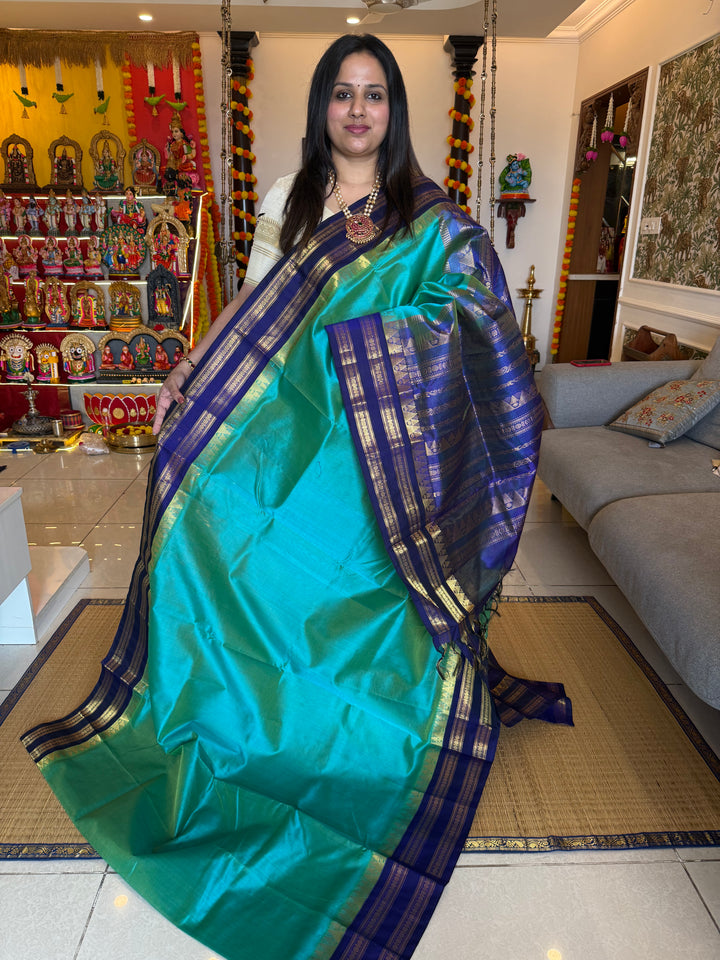 Ramar Blue with Blue  Vairaoosi Zari Lines in the body traditional borders and rich pallu korvai silk cotton saree
