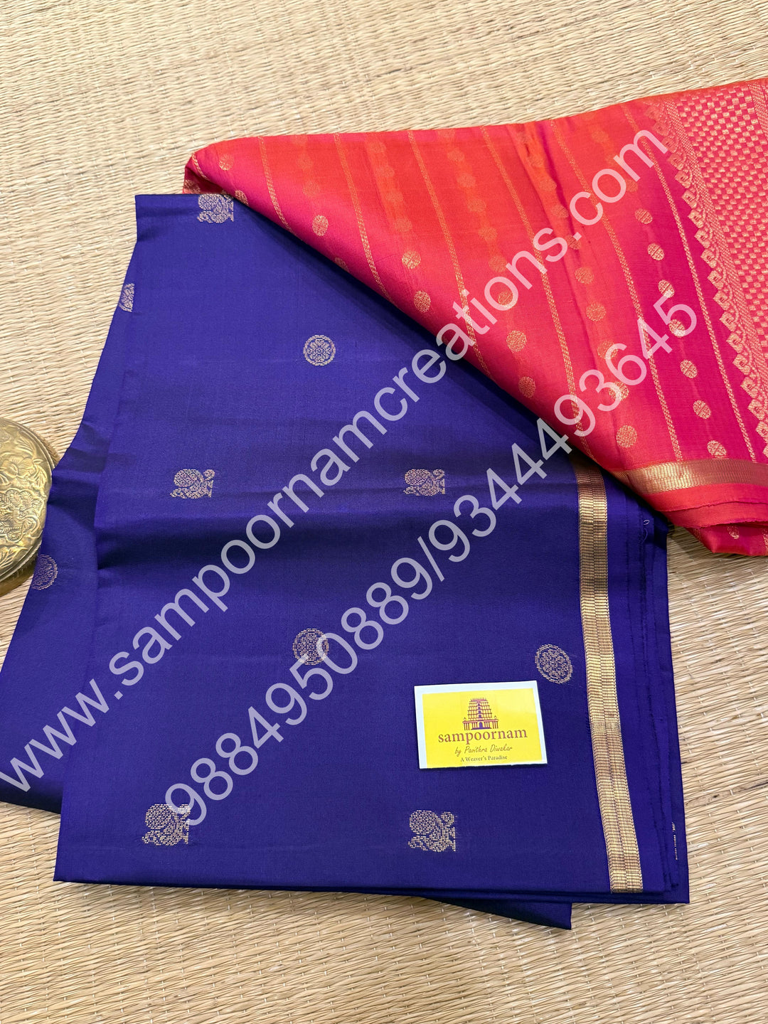 Dark Indigo Blue with Orangish Pink ,Small Zari Border, Zari butta in the Body and Grand Pallu , Pure Soft Silk Saree