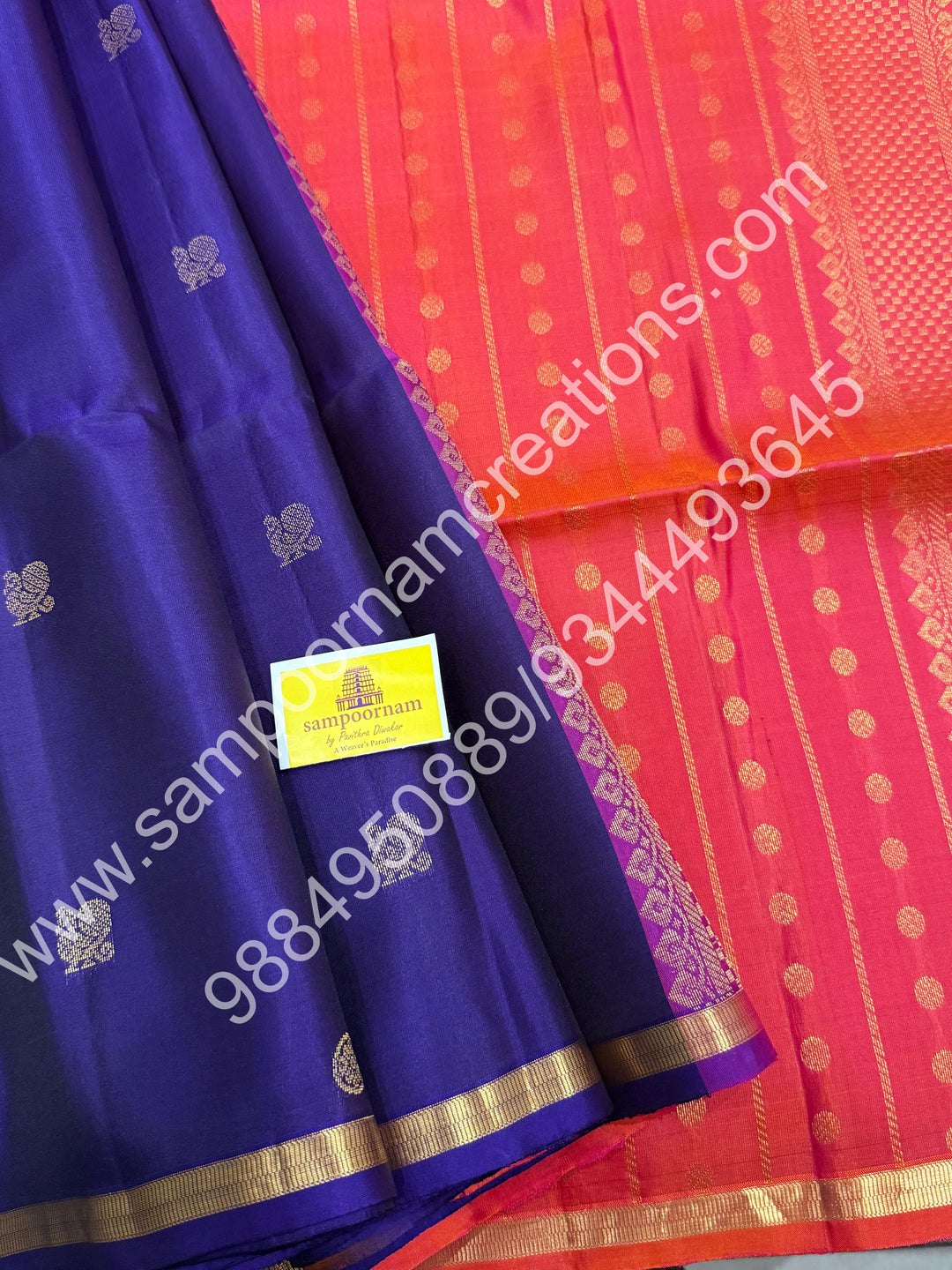 Dark Indigo Blue with Orangish Pink ,Small Zari Border, Zari butta in the Body and Grand Pallu , Pure Soft Silk Saree