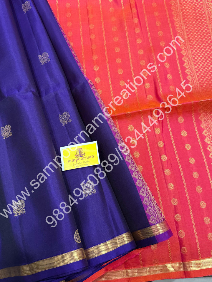 Dark Indigo Blue with Orangish Pink ,Small Zari Border, Zari butta in the Body and Grand Pallu , Pure Soft Silk Saree